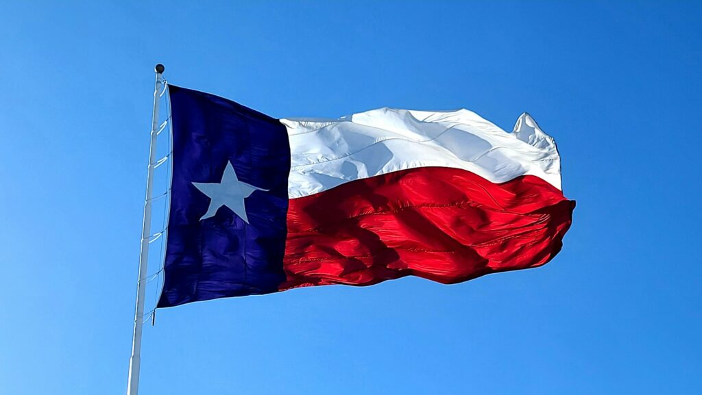 Texas state flag on a windy day in Waco.